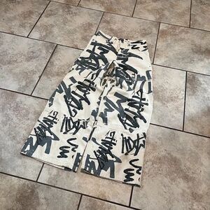 boohooMAN Extreme Baggy Rigid Graffiti Laser Print Jeans Size 28 Ecru Cream